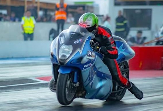 Accused pimp Luke Farrugia is in the UK drag-racing his bike