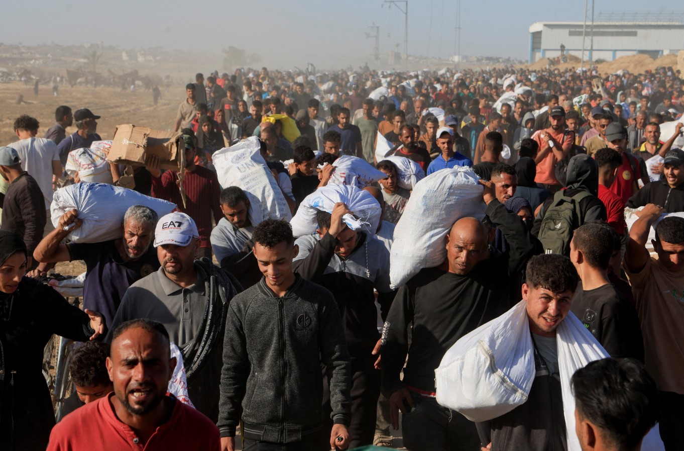 Israeli soldiers told Haaretz they have been ordered to shoot at Palestinians gathering for aid